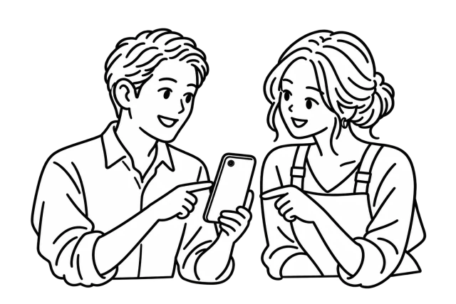 A man showing a hairstyle on his phone to a stylist